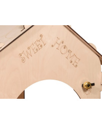 Wooden house for children with board and table